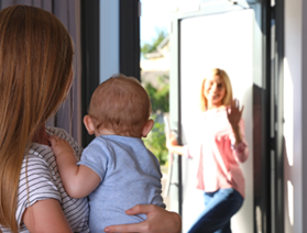 woman holding baby